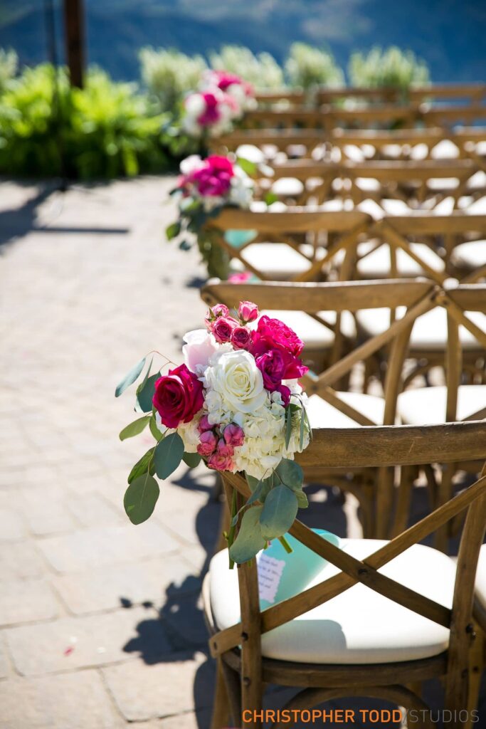 Chairs with Flowers at Malibu Rocky Oaks Wedding | Catered by Made By Meg