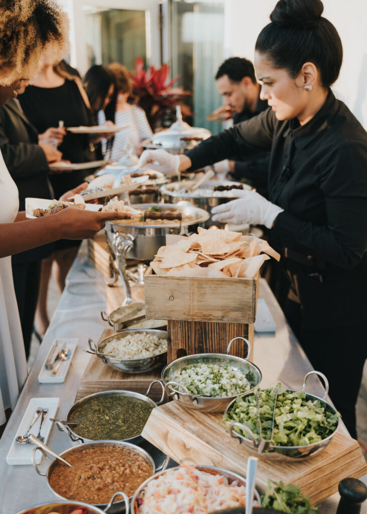 Taco bar station and an event with a variety of chips and salsas 