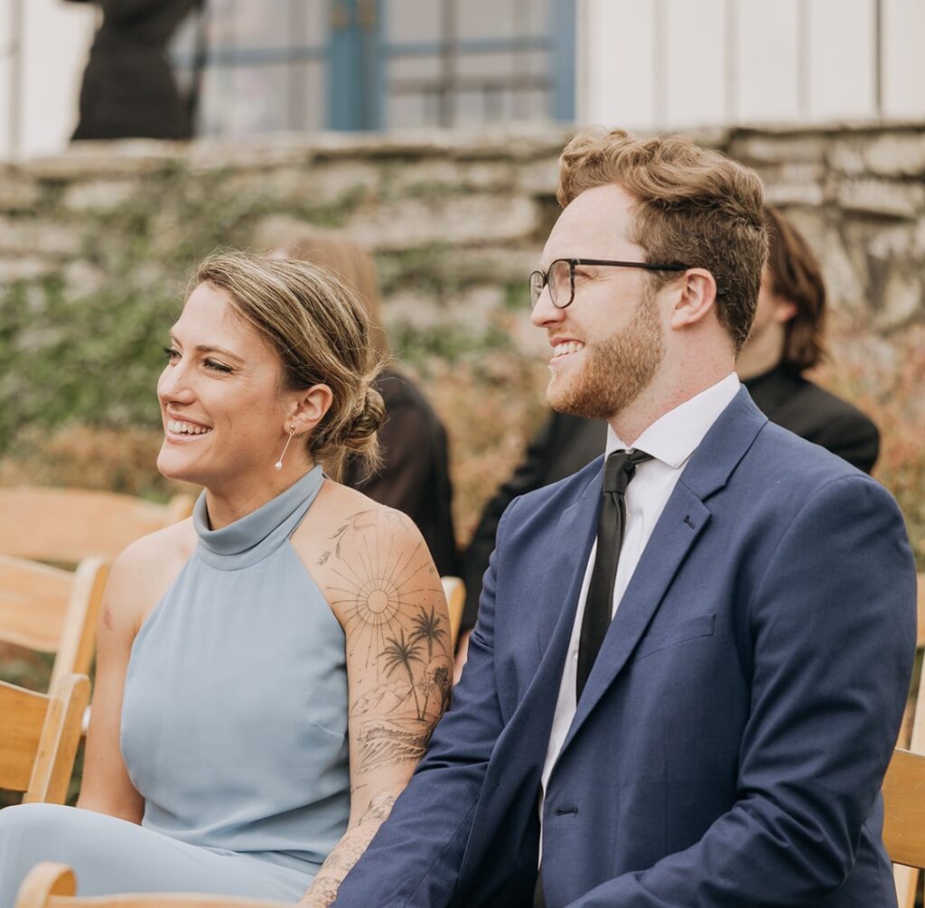 Guests Seated and Smiling During La Venta Inn Wedding Ceremony for Sabrina and Ralph Hill