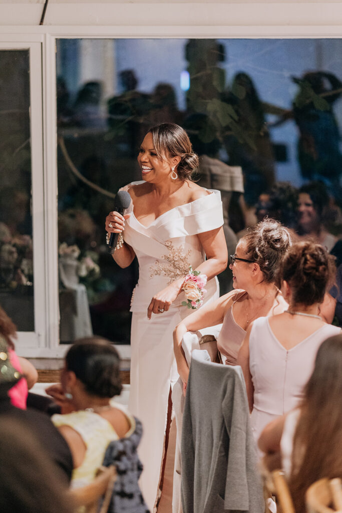 Close Up of Mother of the Groom Speech Next to Sweetheart Table at La Venta Inn Wedding